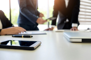 Administrator business man financial inspector and secretary making report, calculating balance. Internal Revenue Service checking document. Audit concept