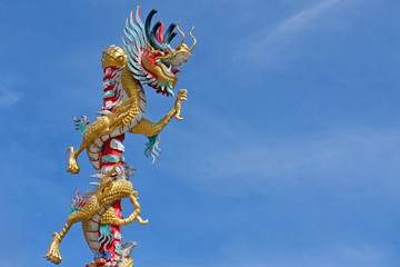 chinese dragon sculpture with bluesky