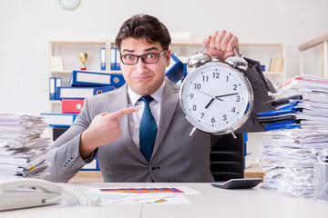 Businessman missing deadlines due to excessive work