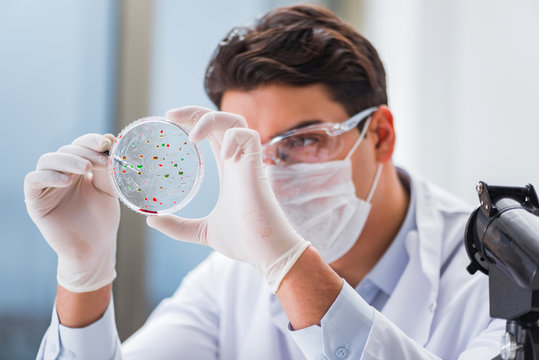 Male Doctor Working In The Lab On Virus Vaccine