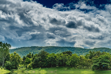 Mountain with dark cloud