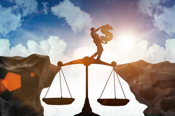 Businessman holding dollar sign in justice concept