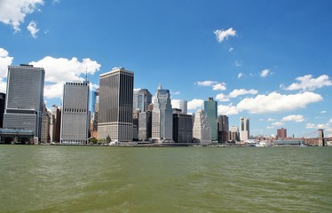 Downtown New York City skyline with the Hudson River in the foreground