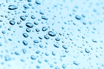 Woman with shopping bags in front on department store.