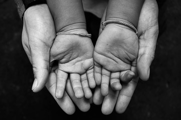 The children's hands are scarce close up.
