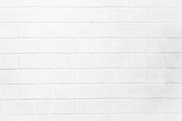Naklejka premium Abstract weathered textured white brick wall background.