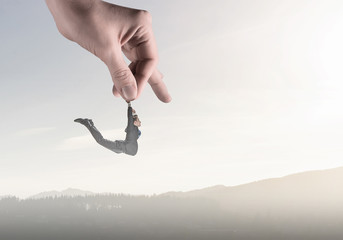 Hand of help and protection . Mixed media