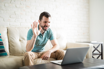 Young man video chatting