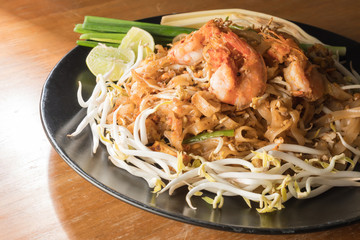 Close up plate of Padthai, Thai noodle with fried shrimp and vegetable,Thai Food, Thailand's national dishes.