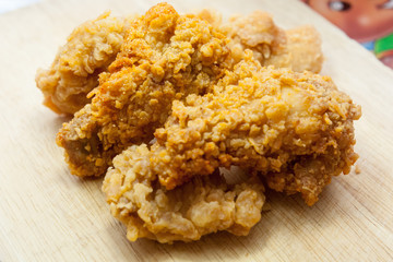 crispy kentucky fried chicken in a white background