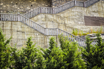 A long stone staircase in a stone wall.