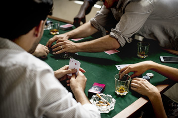 People playing casino game together