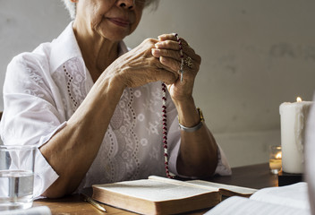 Senior woman prayer faith in christianity religion