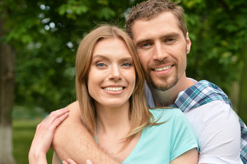 Fototapeta premium happy young couple hugging