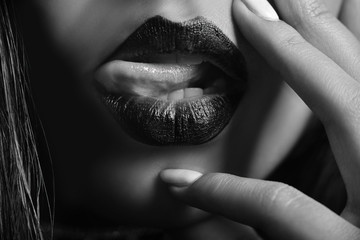 Black and white photo of female plump lips