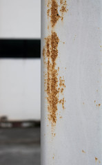 Steel pole and rust.