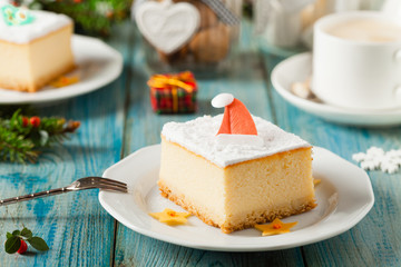 Delicious, traditional cheesecake. Christmas decoration.