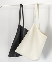 Minimal bag hanging on white background