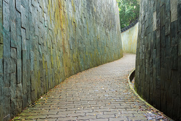 stone walk way in tunnel at Fort Canning Park, Singapore