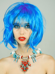 Fashion model with naked body and red lips