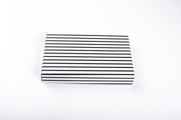 Top view of white box with black racks on white background. Isolated.