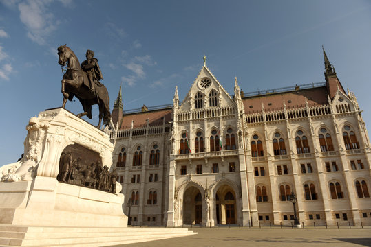 Statue of Gyula Andrassy and Parliament Building in Budapest, Hungari