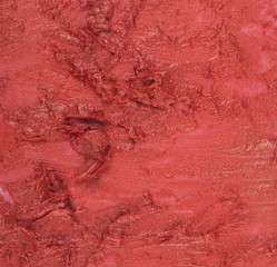 close up of red lipstick texture. Can be used as a background