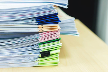 Paper documents stacked in archive