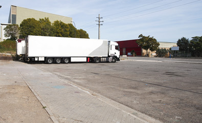 Truck parked in industrial zone