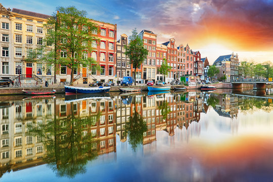 Amsterdam Canal houses at sunset reflections, Netherlands, panorama