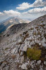 View of steep slopes of high mountains at Gran Sasso National Park, Abruzzo, Italy