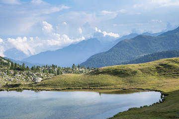 Small mountain lake in Dolomite alps