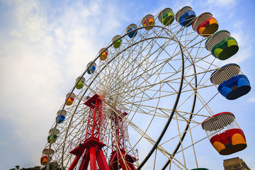Colourful ferris wheel carriages at an amusement park Sydney Australia