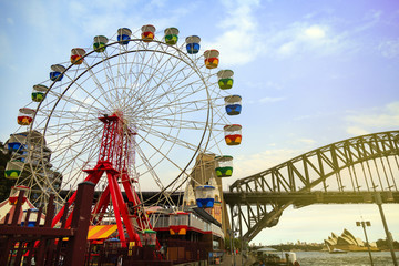 Colourful ferris wheel carriages at an amusement park Sydney Australia