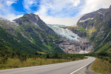 Fototapeta premium Norway road with a view of the glacier in Norway.