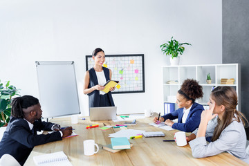multiethnic business coworkers at meeting