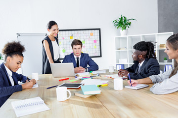Fototapeta premium multiethnic colleagues having business meeting