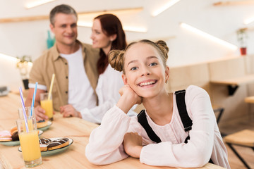 beautiful family in cafe