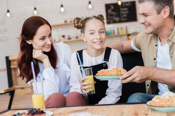 beautiful family in cafe