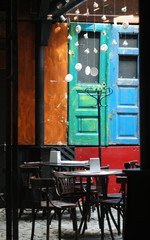 Empty dining tables in street cafe in Lvov