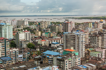 Fototapeta na wymiar Old roofs of Yangon buildings, Myanmar. Top view