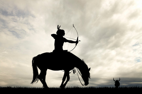 Indian hunter at sunset