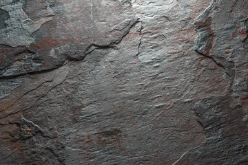 Background of gray with brown colored stone