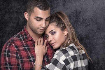 Portrait of fashionable young couple.