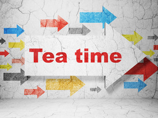 Time concept: arrow with Tea Time on grunge wall background