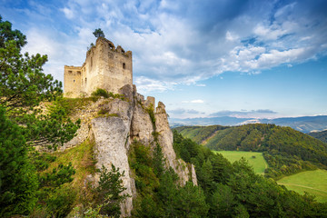 Fototapeta na wymiar The ruins of a medieval castle Lietava on a rocky blade, nearby Zilina town, Slovakia, Europe.