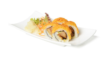 Plate of sushi rolls with salad