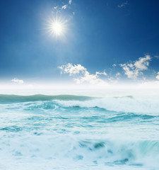 Atlantic ocean big waves seascape under blue sky