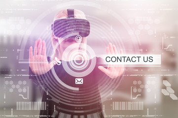 Young female wearing 3d glasses touching contact us