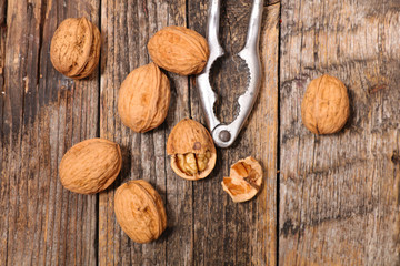 walnut on wood background